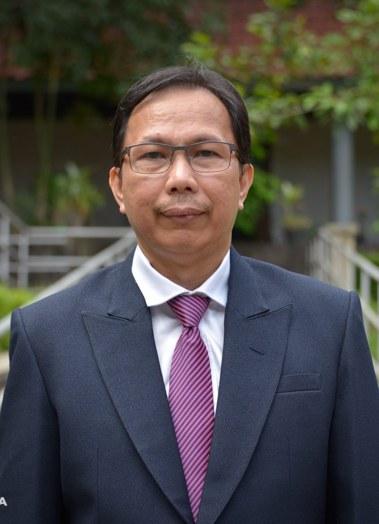 Dr. Drs. Arthur Josias Simon Runturambi, M.Si